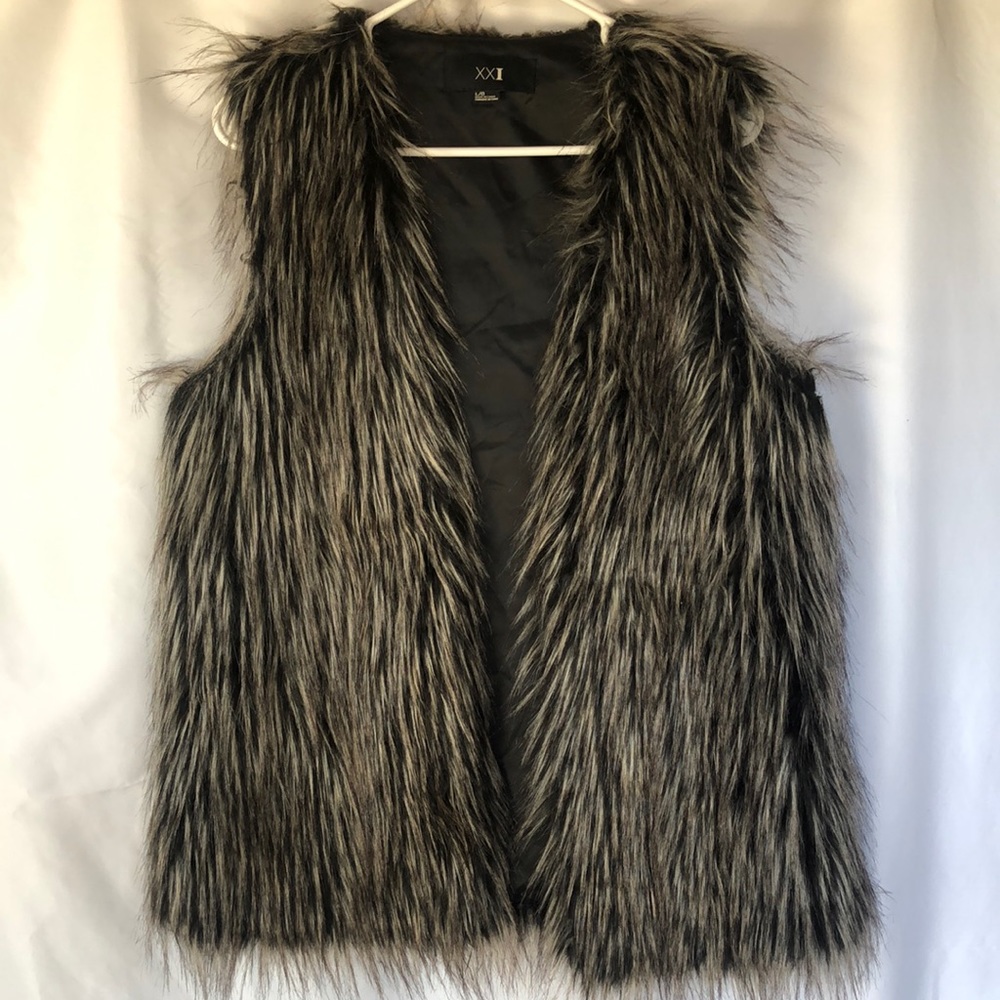 XXI black, brown, and cream faux fur vest. Size Large.